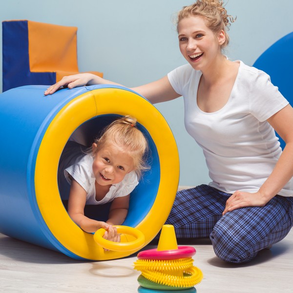 Paediatric Occupational Therapist with child 